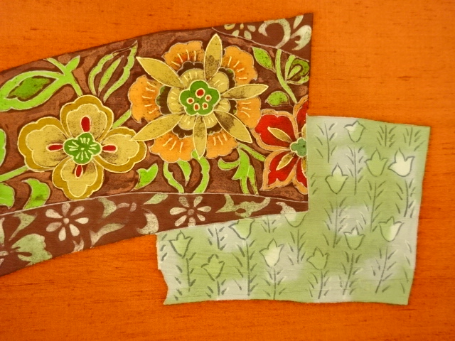  手織り紬金彩色紙に草花模様名古屋帯